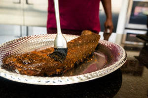 The oak wood smoked baby back ribs or St Louis cut 3 lb slab