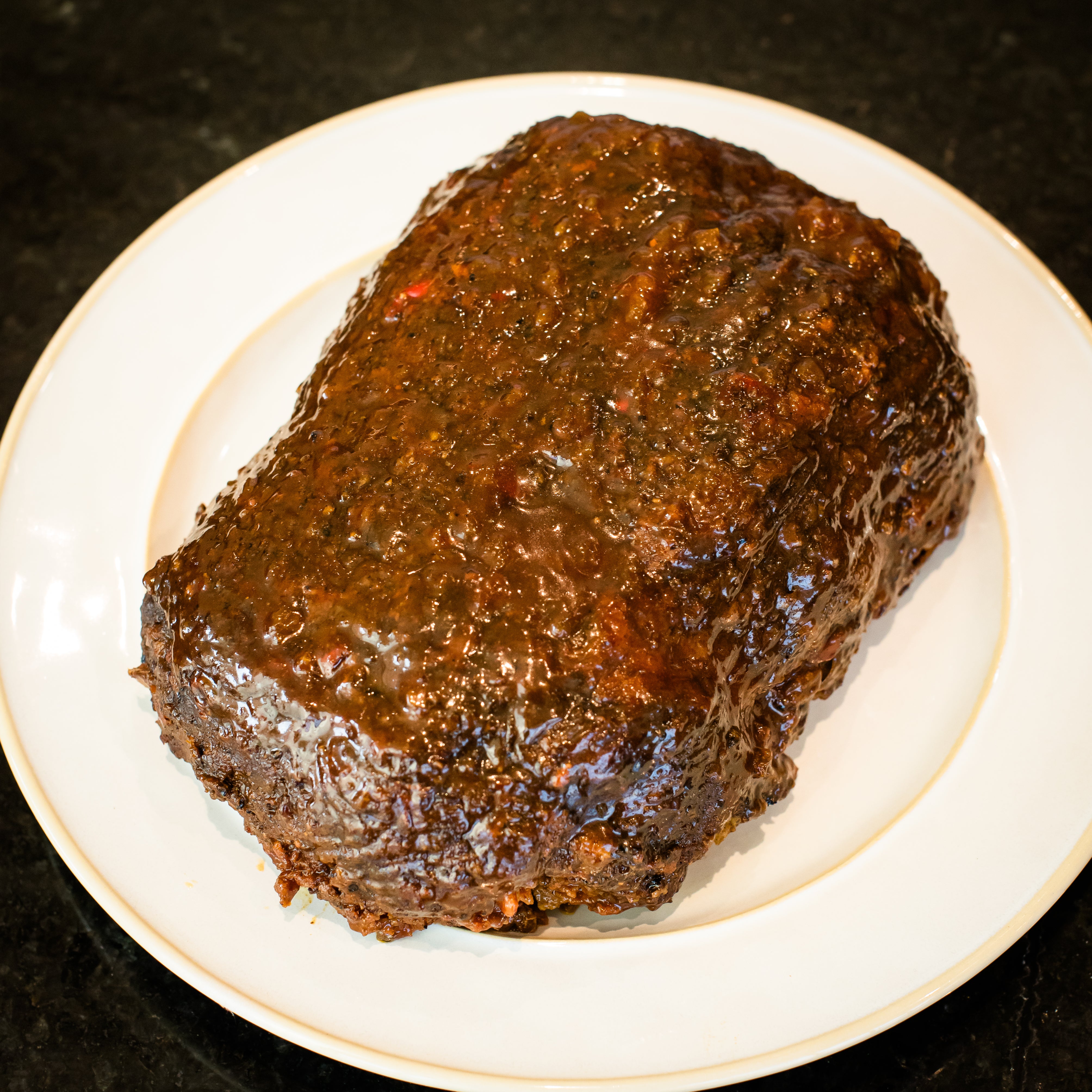 Oakwood smoked meatloaf 4 lbs drizzled with honey mango barbecue sauce