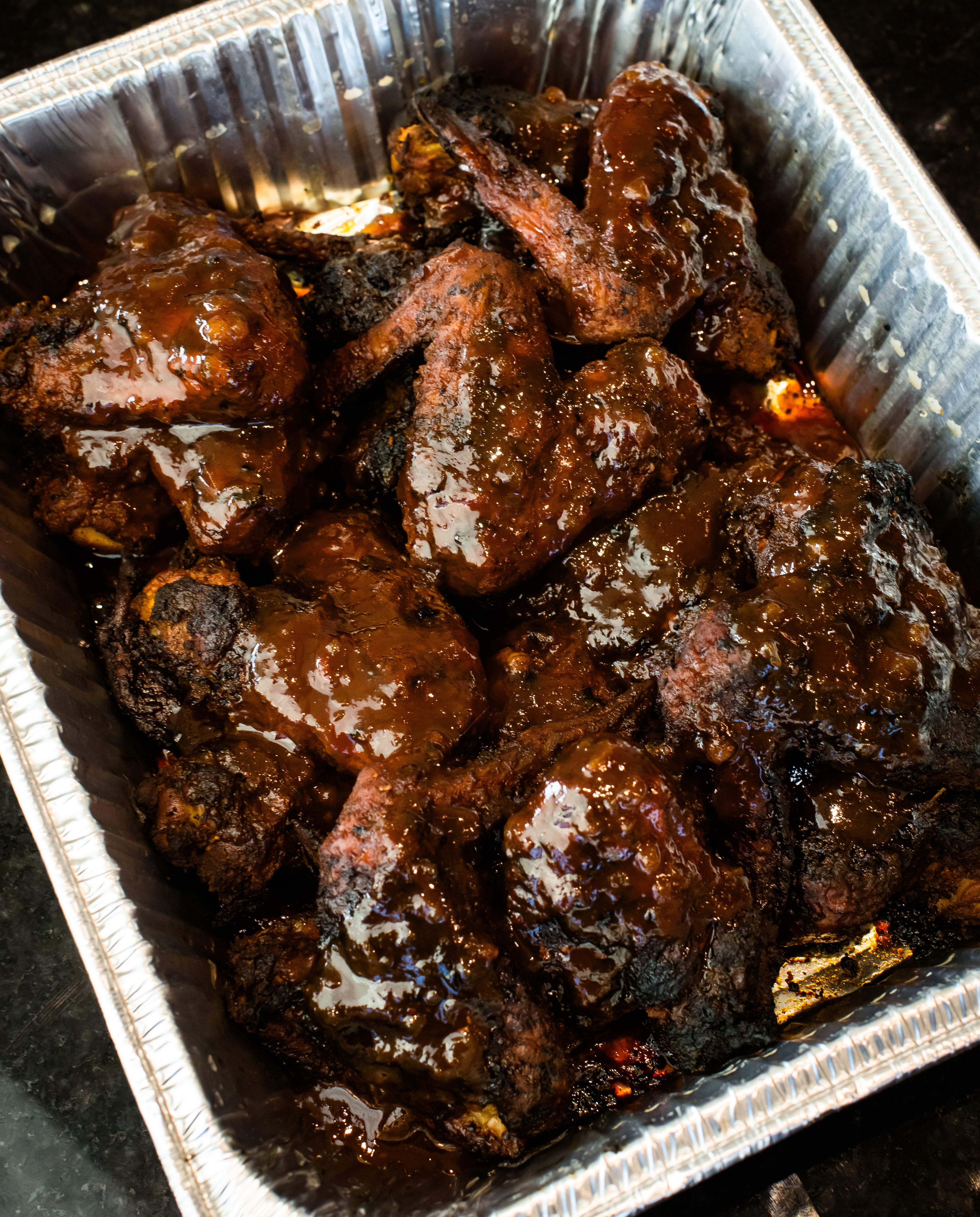 Smokin H's honey peach or honey mango spicy wings.